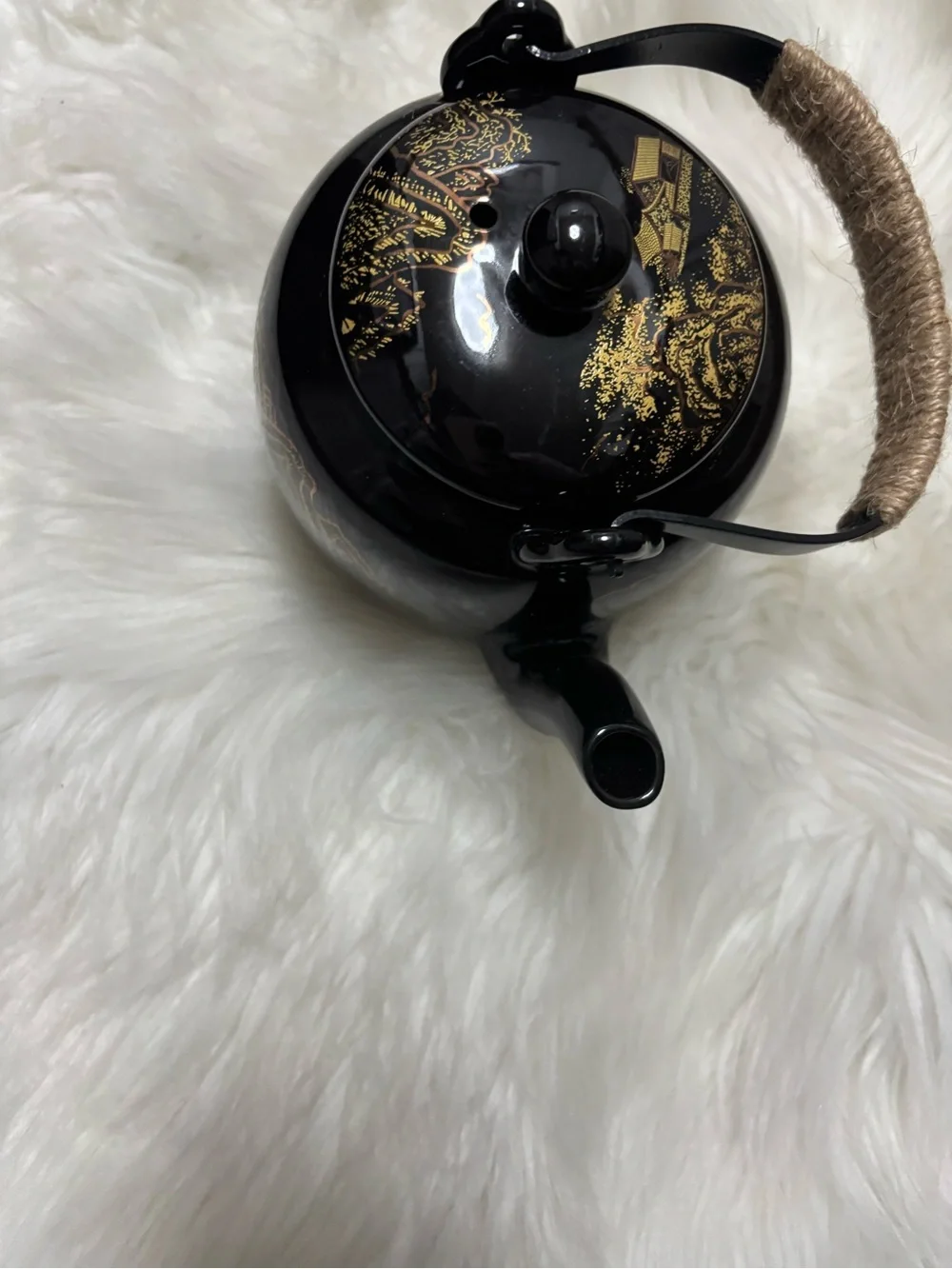 Black and Gold Ceramic Teapot with Woven Handle